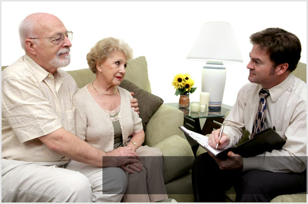 Gerontology Psychologist with an elderly couple